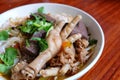 Rice noodles with spicy pork sauce and Chicken foot.